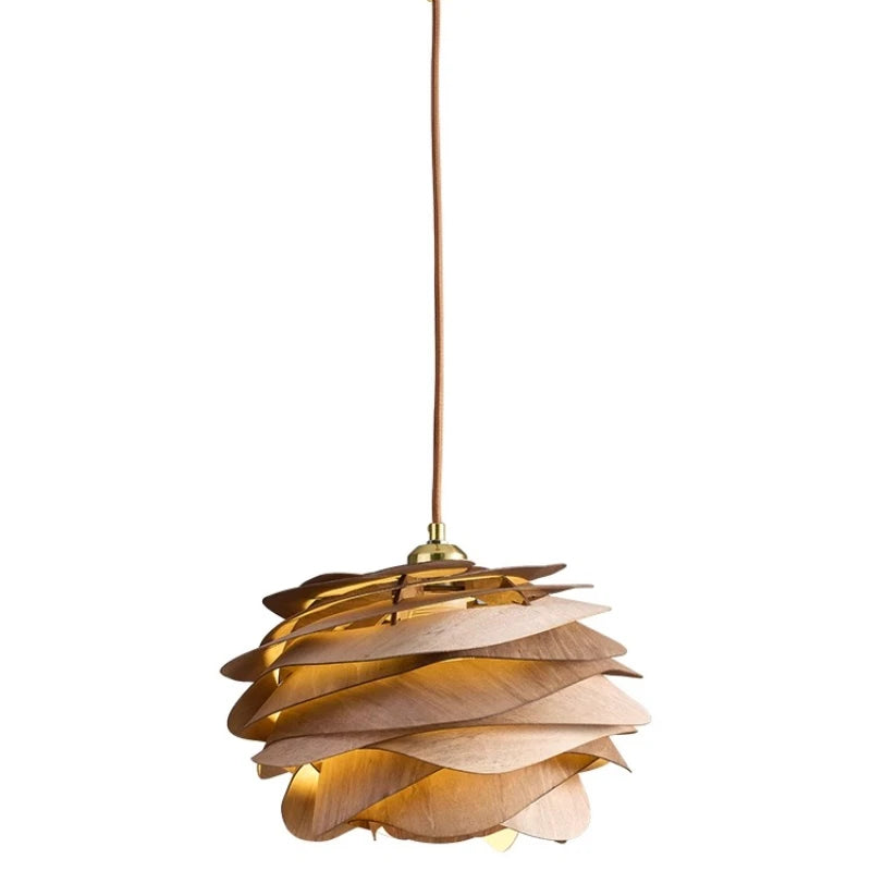 Gold pendant light with a unique design on a white background
