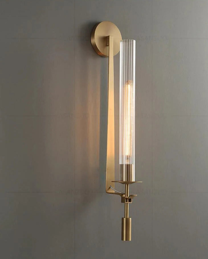 Mid century modern brass wall light with tall ribbed glass shade