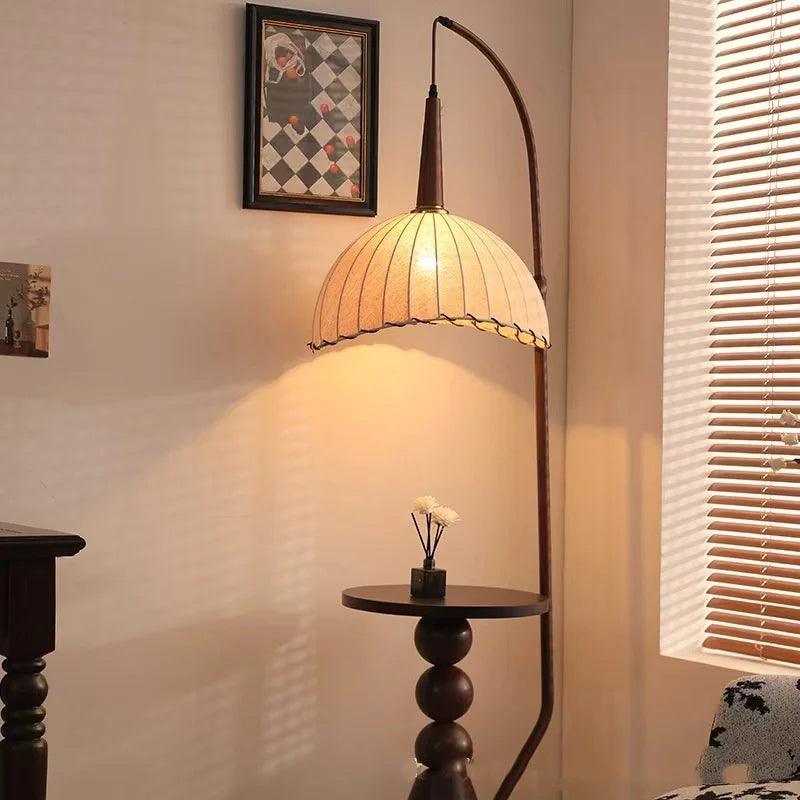 Minimalist lamp and table combo placed near a window in Scandinavian-style home