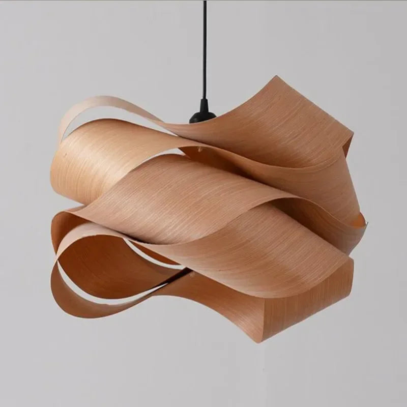 Wooden pendant lamp with wavy design on a plain background
