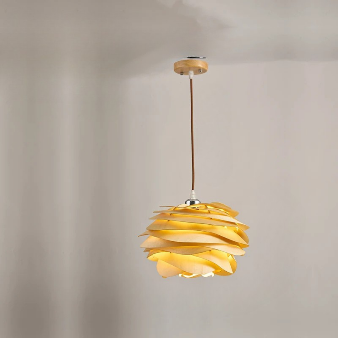 Yellow pendant light with wooden finish on a plain background