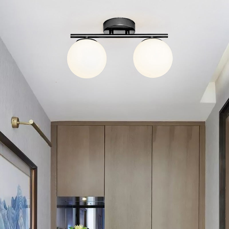 Close-up of milk glass globe ceiling light