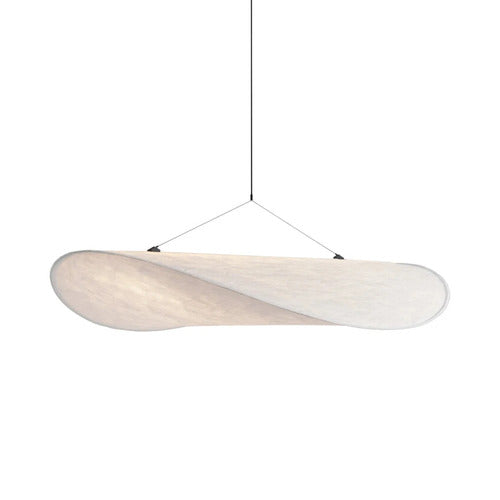 New Works Tense Light Pendant displayed in a showroom