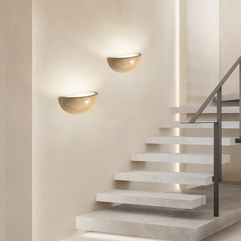 hand-carved stone wall sconce