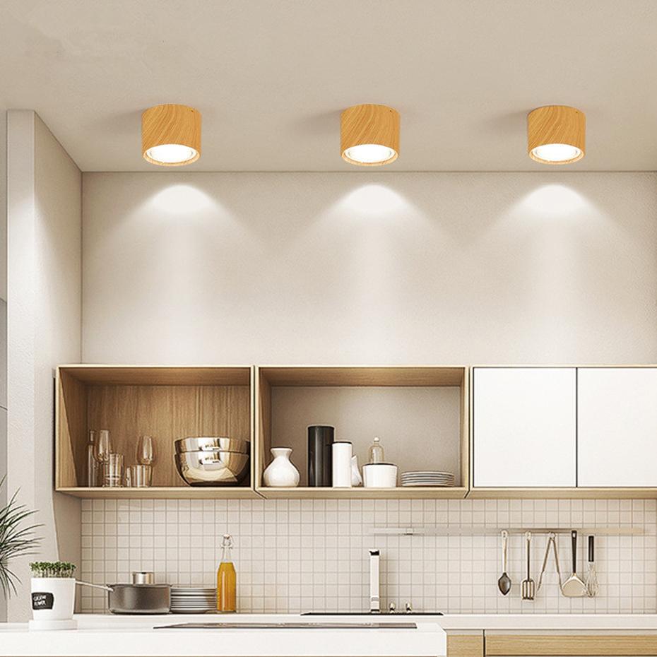 Mounted wooden ceiling lamp in cozy interior