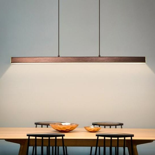 modern linear chandelier over a table