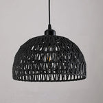 Black woven pendant light on a gray background