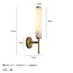 Elegant wall lamp in gold finish, ideal for accent lighting in living rooms or entryways