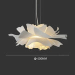 Floral-patterned pendant light with a dark background