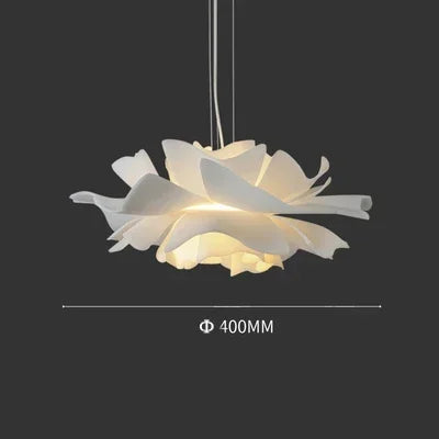 Floral-shaped pendant light with a dark background