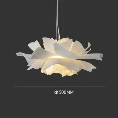 Floral-style pendant light with a dark background