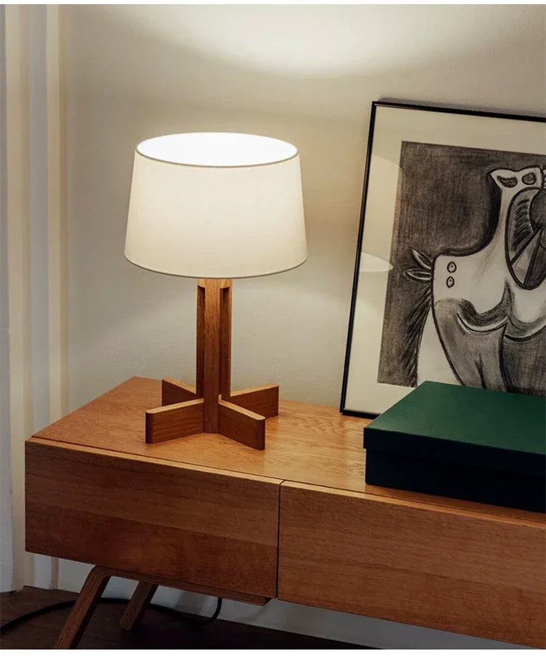 Warm ambient lighting from wooden lamps with white linen shades