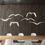 Bird wing chandelier with multiple flying bird light design