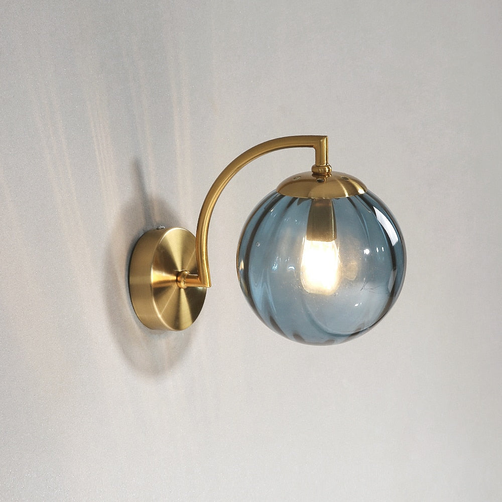 blue glass globe wall sconce