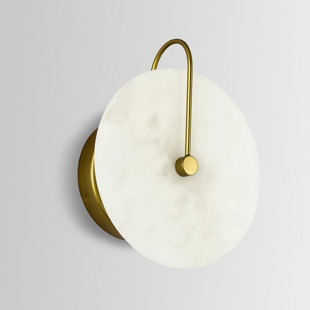 white circular marble wall sconce