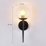 clear glass globe sconce light