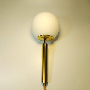 frosted globe sconce gold
