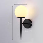 frosted glass globe wall sconce