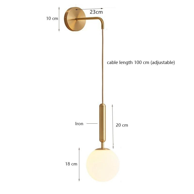 gold globe wall sconce