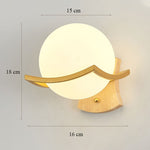 wall-mounted white glass sconce lamp