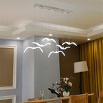 Modern bird wing chandelier in contemporary living room