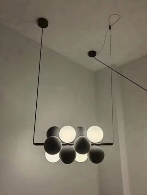 real shot lunar globe chandelier