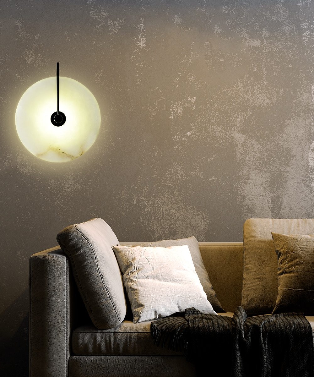 white circular marble wall sconce