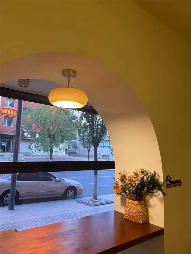 yellow round ceiling light