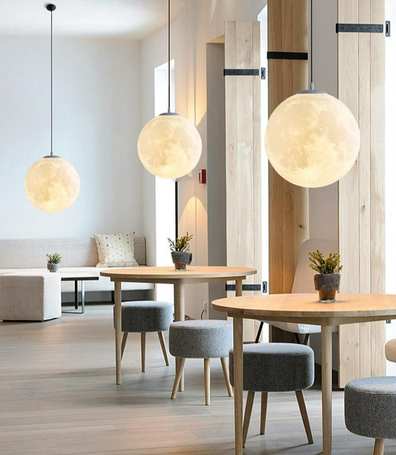 Moon lamp hanging above a reading corner