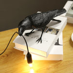 Unique resin crow lamp used as a desk light
