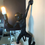 black monkey wall lamp