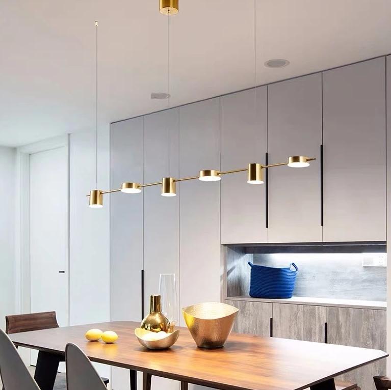 gold linear chandelier kitchen island