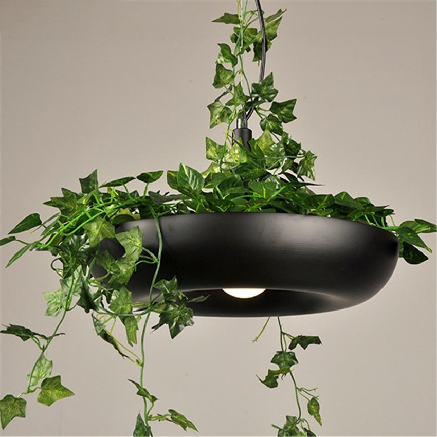 black hanging plant light fixture