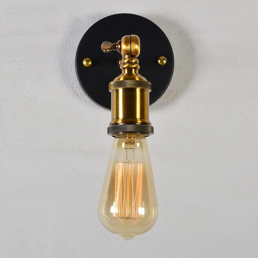 black and brass wall sconce