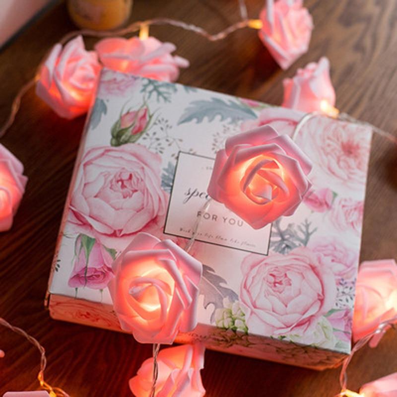 Battery-powered LED flower lamp in soft white glow