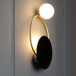 round brass wall sconce