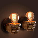 industrial hand-shaped wall lamp