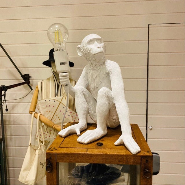 white monkey lamp sit